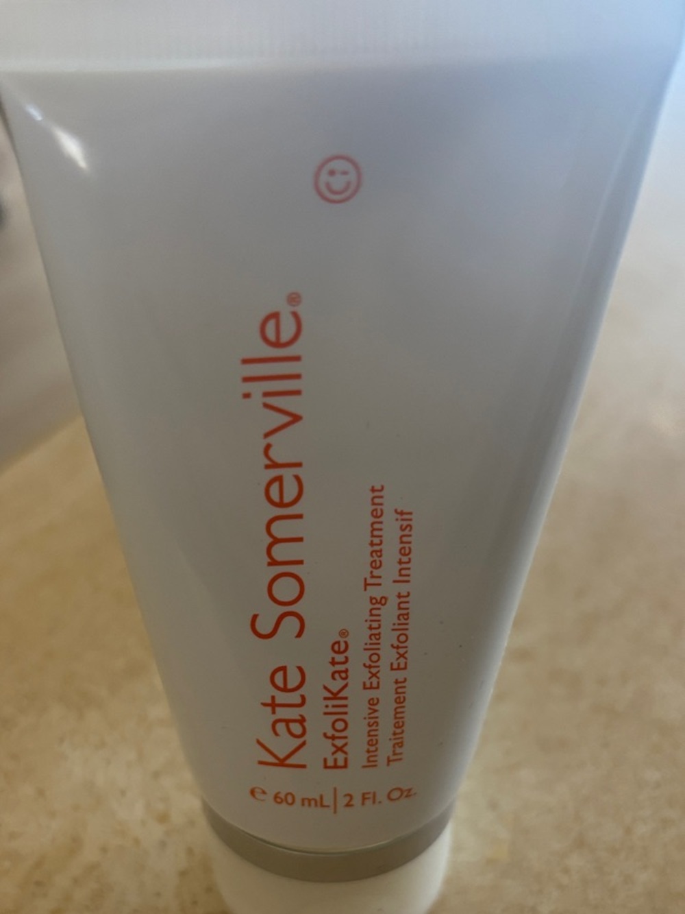 Kate Somerville White Tube with Coral Logo Exfoliator